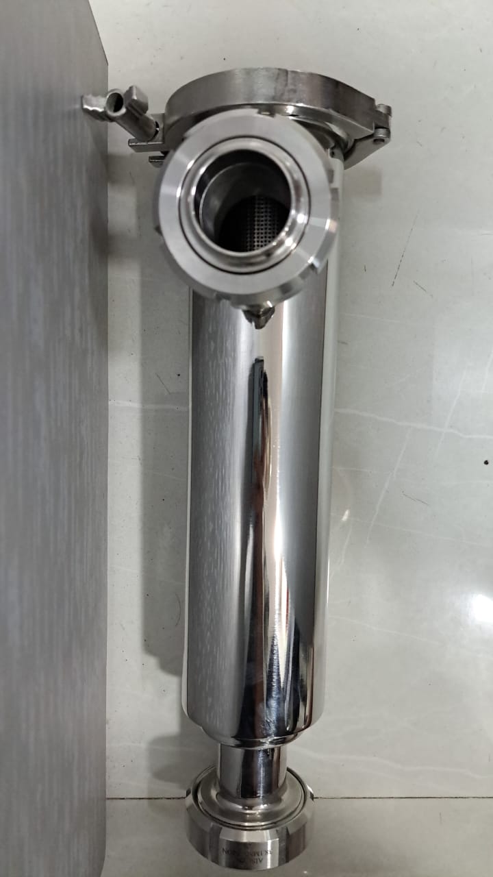 End view of a stainless steel inline filter showing its internal mesh screen.