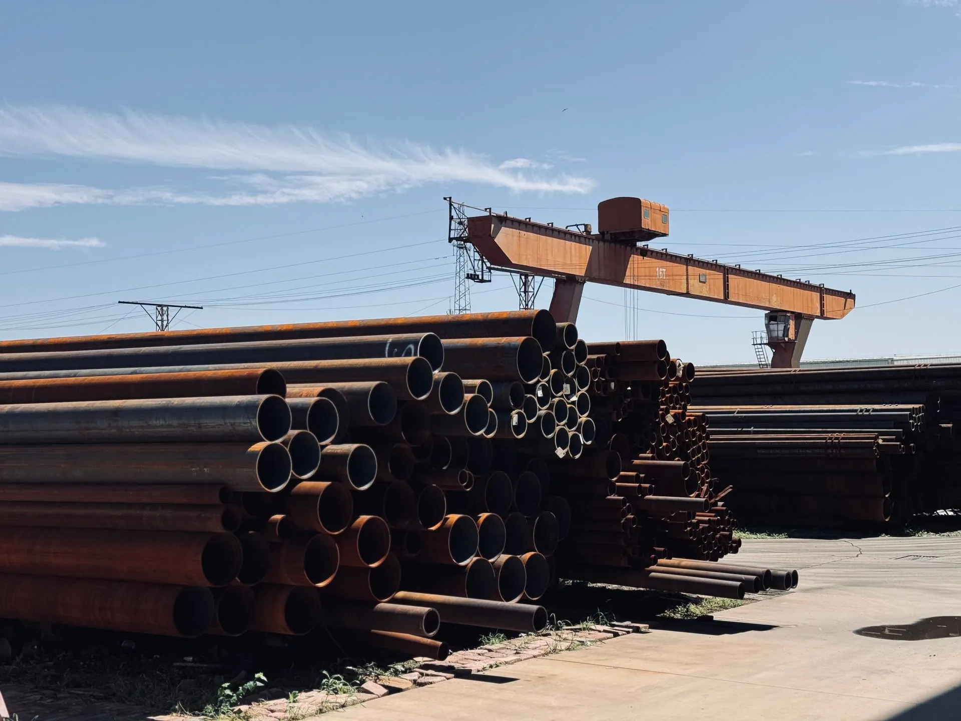 Stainless steel pipes in an industrial stockyard — Sunlite Metal Industries, Mumbai