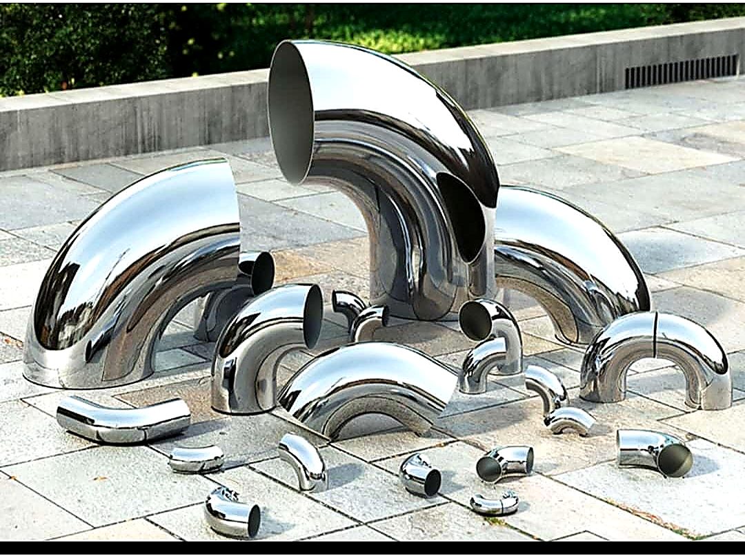 Assorted sanitary stainless steel weld elbows in 45, 90 and 180 degree patterns