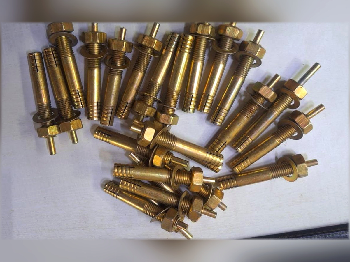 Gold-tone plated anchor fasteners with nuts and expansion sleeves